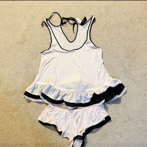 NWT!! Victoria’s Secret two piece babydoll sleep set. Soft pink with black trim